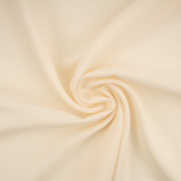 Tissu de polyester uni fantaisie - Ivoire